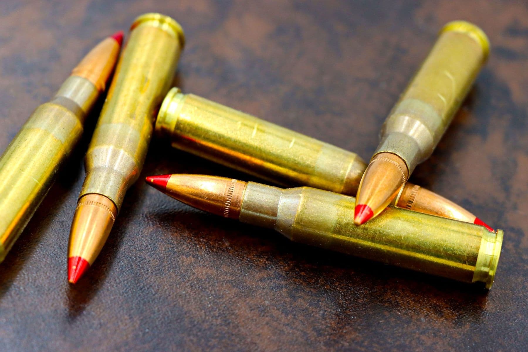 Large-calibre rifle cartridges with red polymer tips